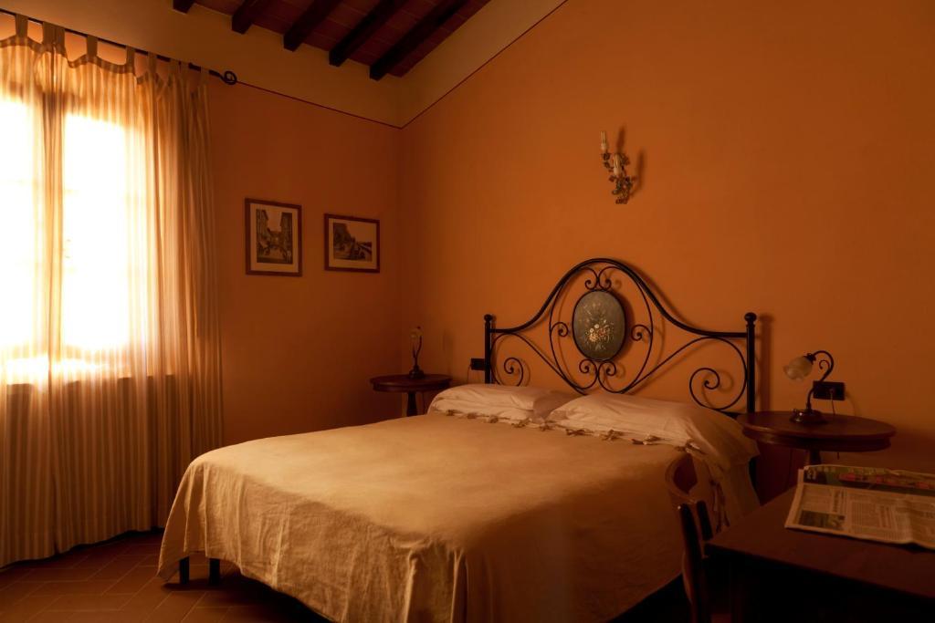 Agriturismo Fattoria Rozzalupi Черрето-Гуїді Номер фото