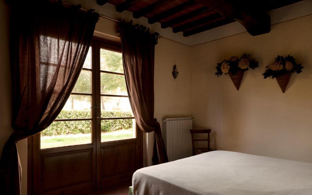 Agriturismo Fattoria Rozzalupi Черрето-Гуїді Номер фото
