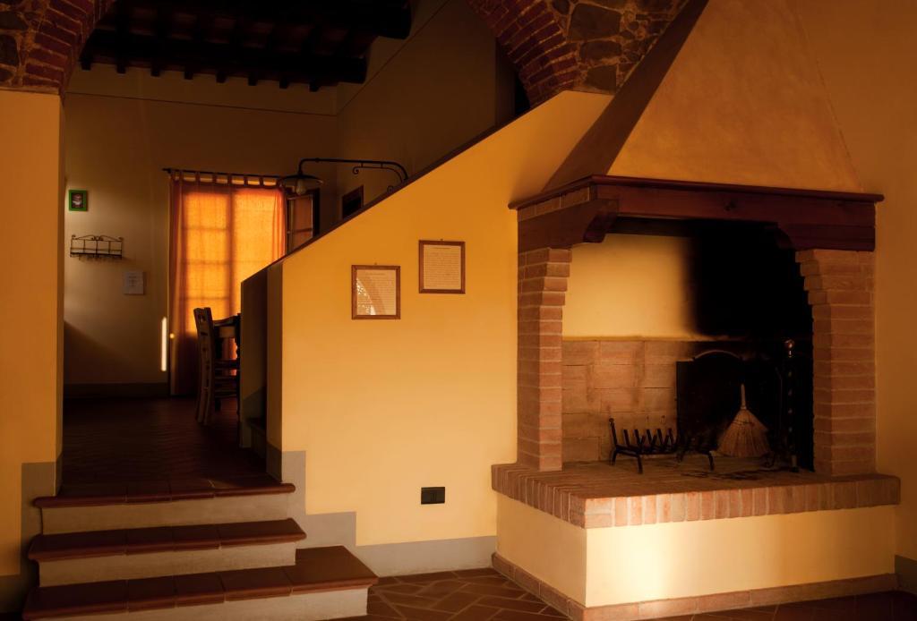 Agriturismo Fattoria Rozzalupi Черрето-Гуїді Номер фото